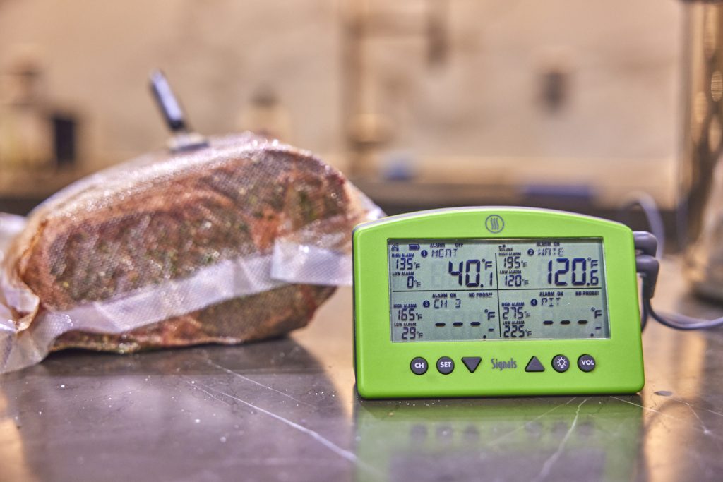 Prime rib ready to cook with thermometer