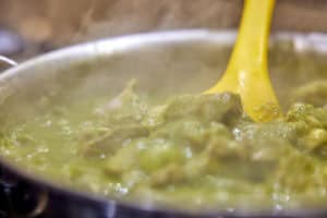 Pork cooking in chili sauce