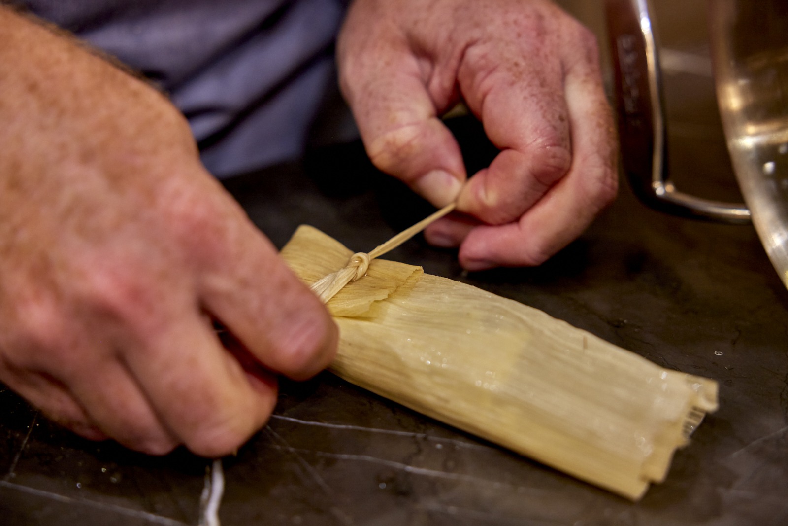tying the tamale closed