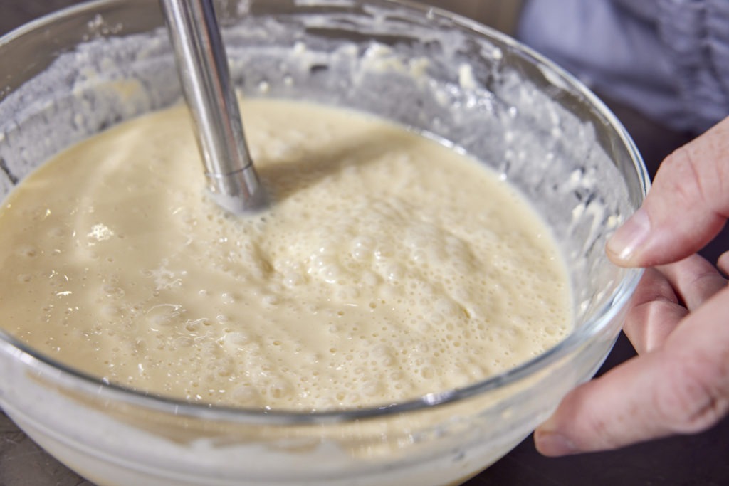 Using a stick-blender to smooth the batter