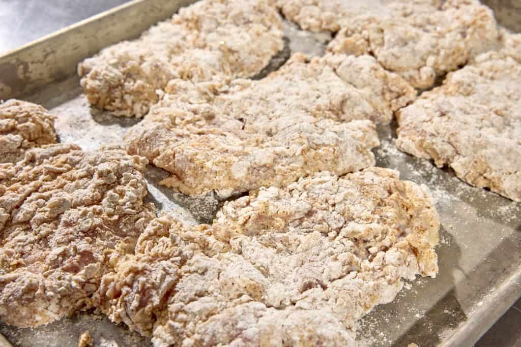 Breaded chicken, ready for frying