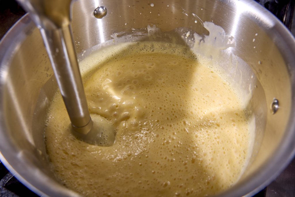 blending the cheese sauce for maximum smoothness