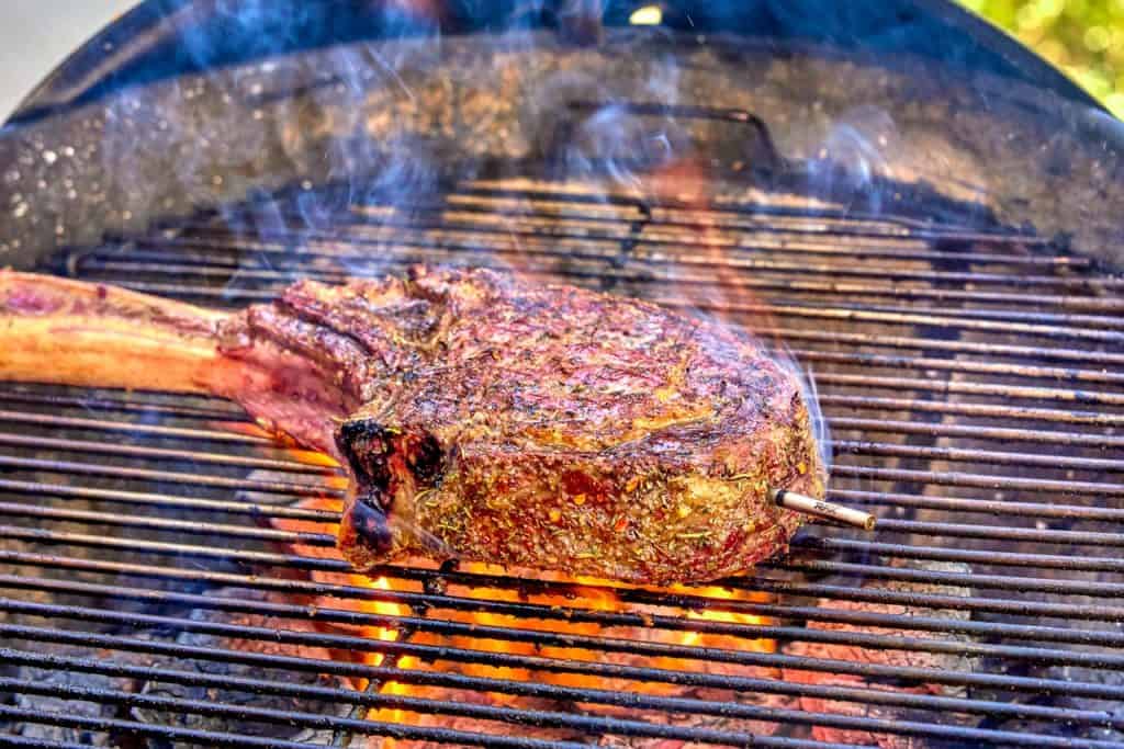 Steak on a fiery grill