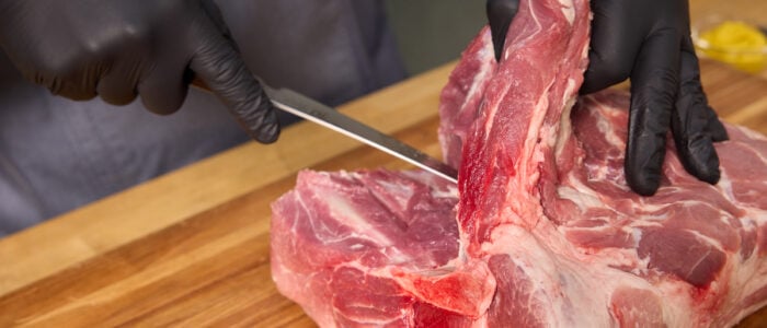 Cutting out the pork bone