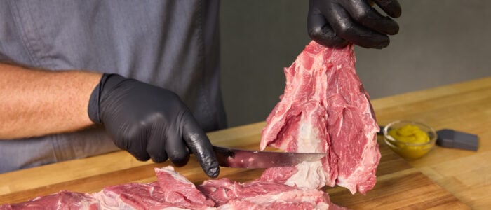 Removing the bone form the pork