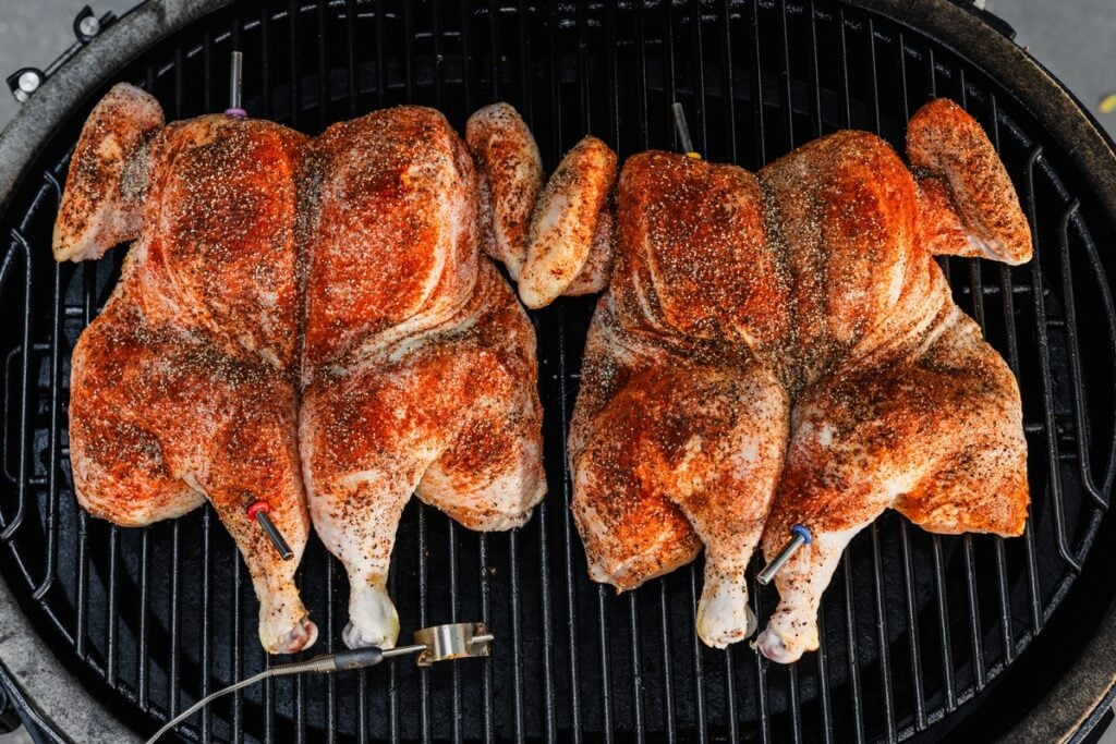 Two chickens on a smoker
