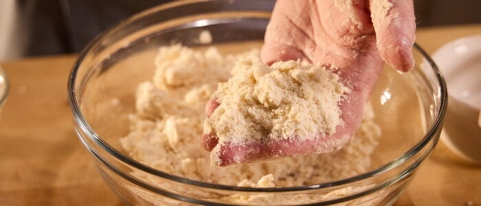 Rubbing the butter into the dry ingredients