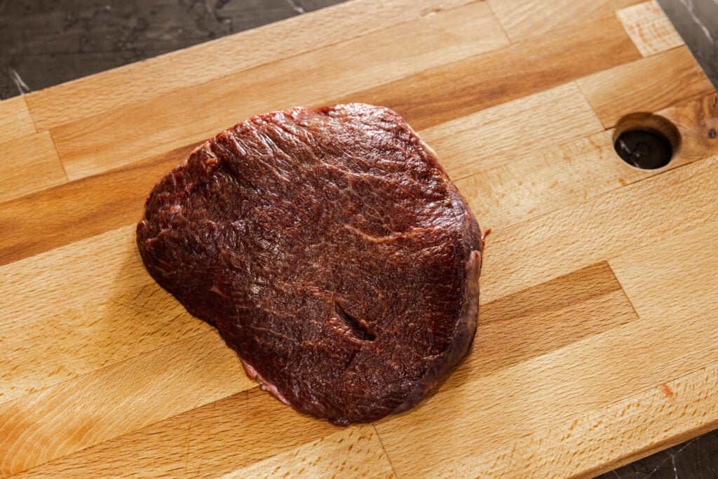 raw beef cheek on board
